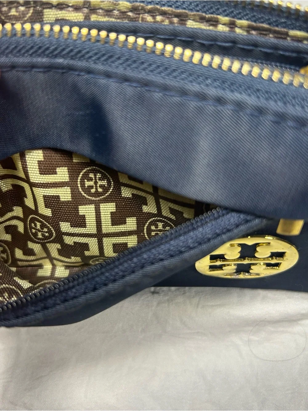 Tory Burch Navy Wristlet with Gold Emblem